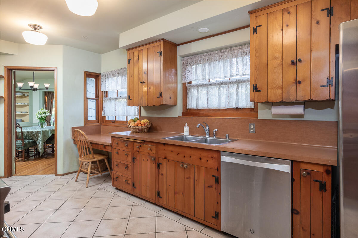 424 North Old Ranch Road Arcadia, CA 91007 - Photo 16 of 54 a kitchen with a sink cabinets and window