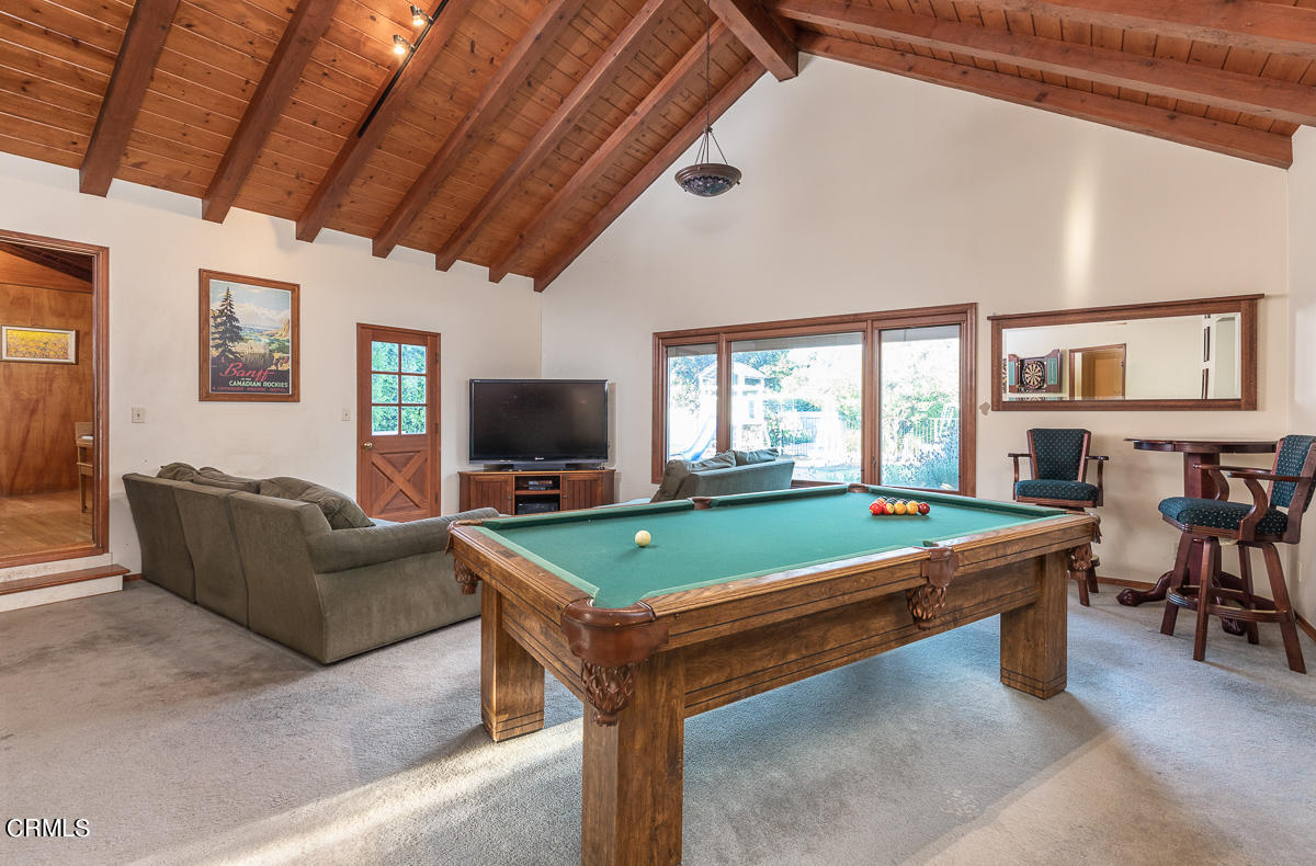 424 North Old Ranch Road Arcadia, CA 91007 - Photo 22 of 54 a living room with furniture and a flat screen tv