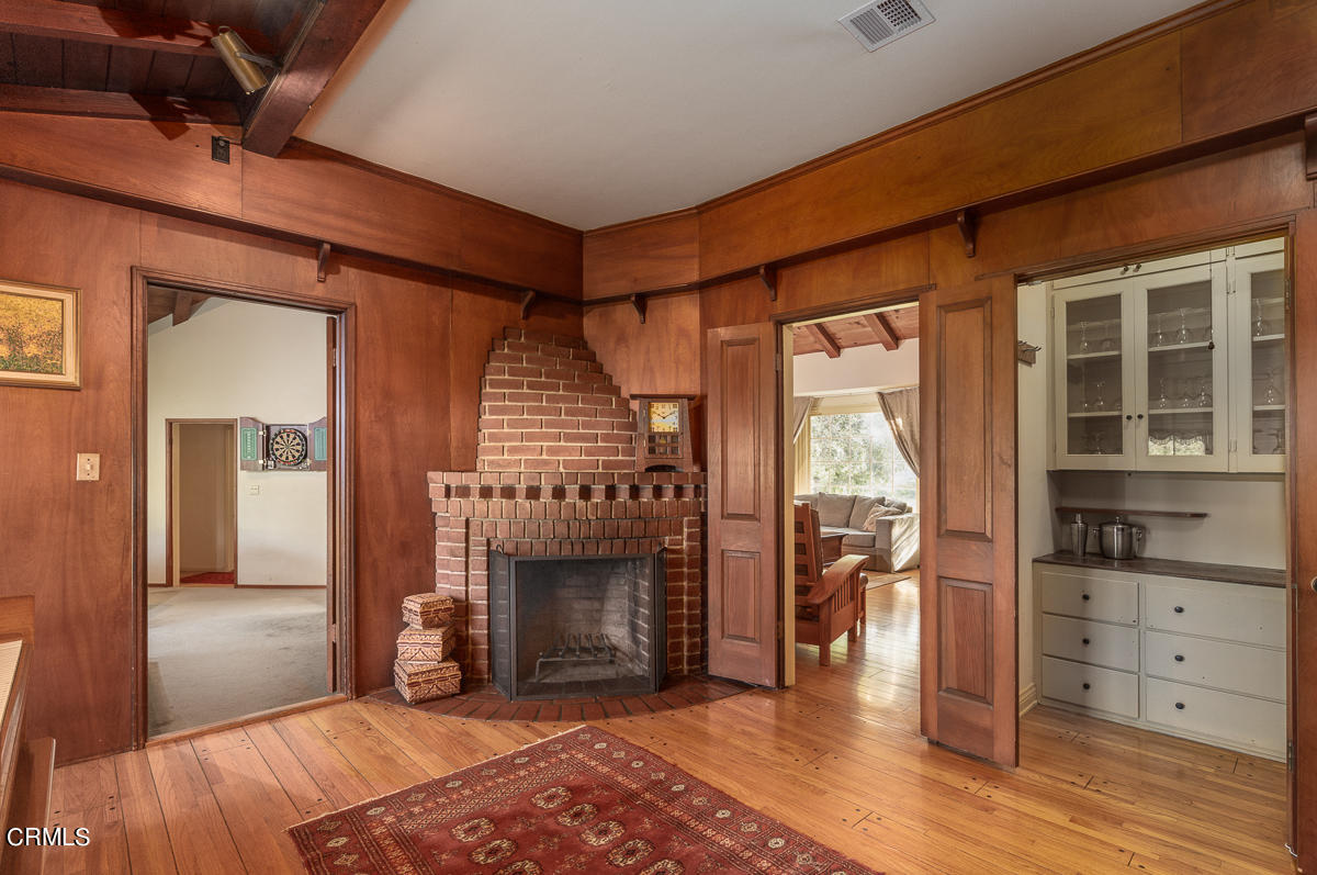 424 North Old Ranch Road Arcadia, CA 91007 - Photo 23 of 54 an empty room with furniture and a fireplace