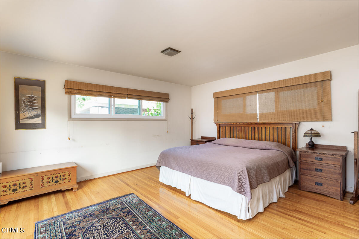 424 North Old Ranch Road Arcadia, CA 91007 - Photo 28 of 54 a bedroom with a bed and a window