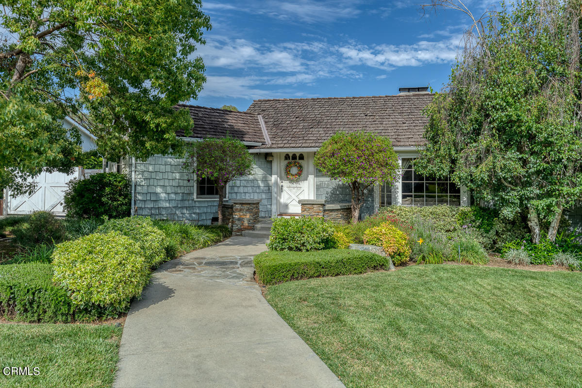 424 North Old Ranch Road Arcadia, CA 91007 - Photo 4 of 54 a front view of a house with garden