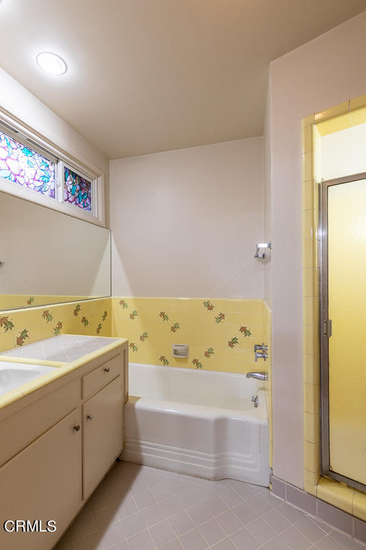 424 North Old Ranch Road Arcadia, CA 91007 - Photo 32 of 54 a bathroom with a bathtub and a sink