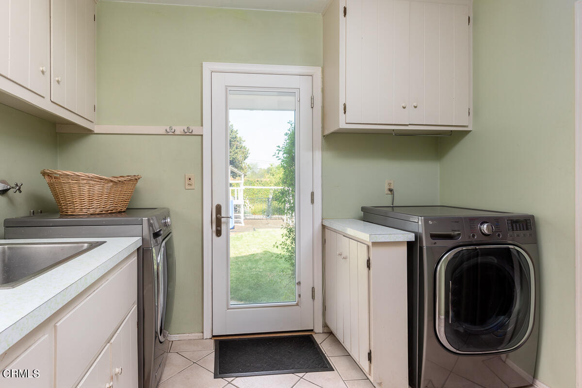 424 North Old Ranch Road Arcadia, CA 91007 - Photo 39 of 54 a kitchen with a stove top oven sink and cabinets