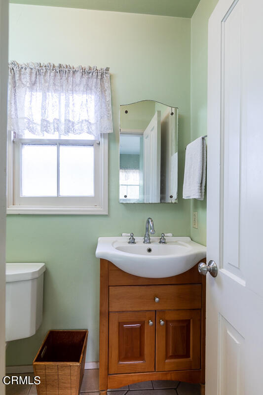 424 North Old Ranch Road Arcadia, CA 91007 - Photo 40 of 54 a bathroom with a sink and a mirror