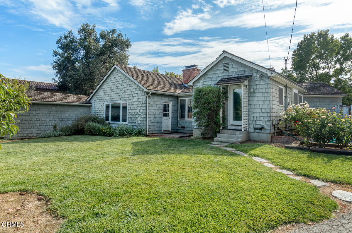 424 North Old Ranch Road Arcadia, CA 91007 - Photo 41 of 54 a front view of house with yard and green space