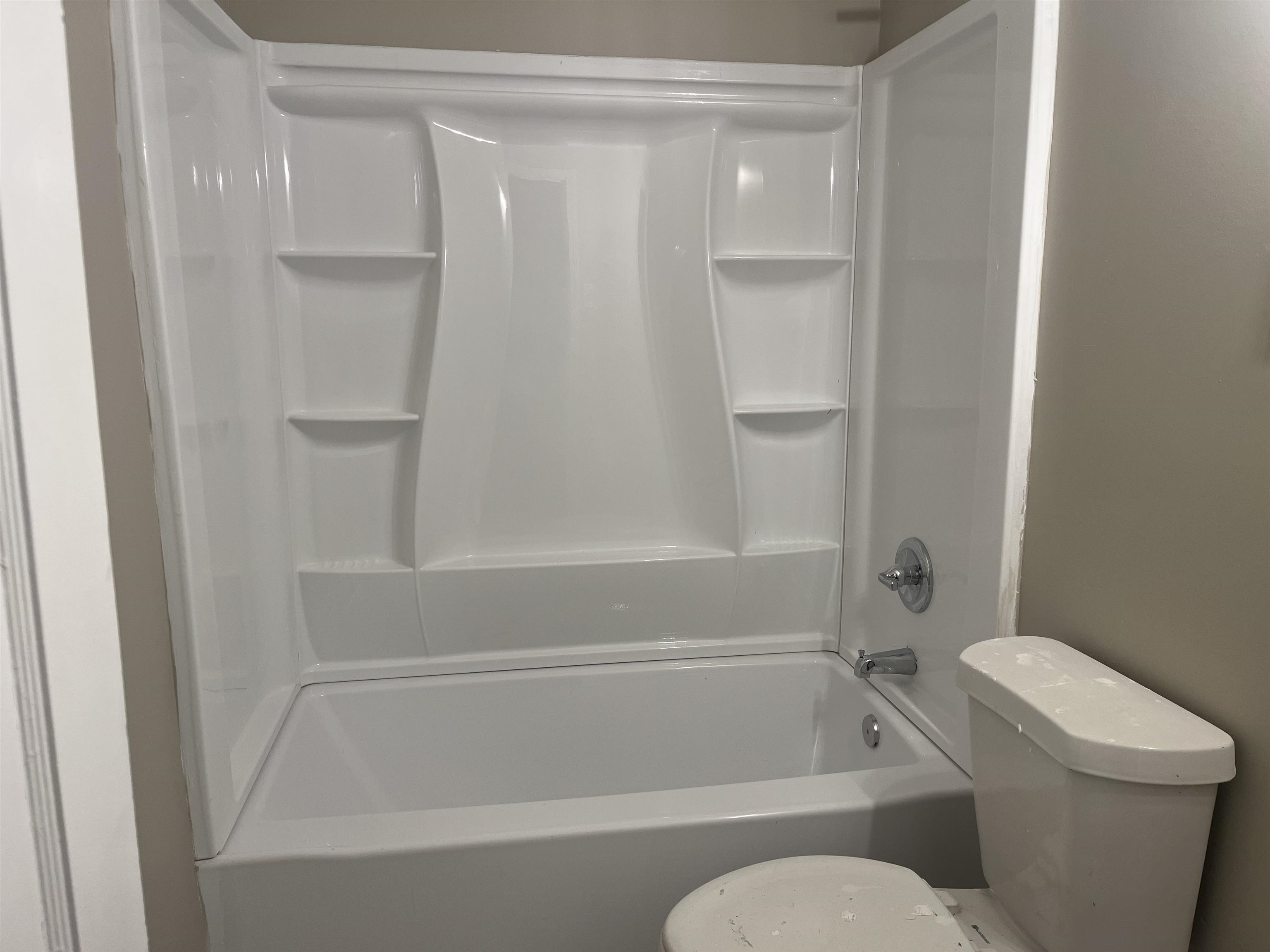 1591 Cherry Road Memphis, TN 38111 - Photo 5 of 8 a bathroom with a shower and a toilet
