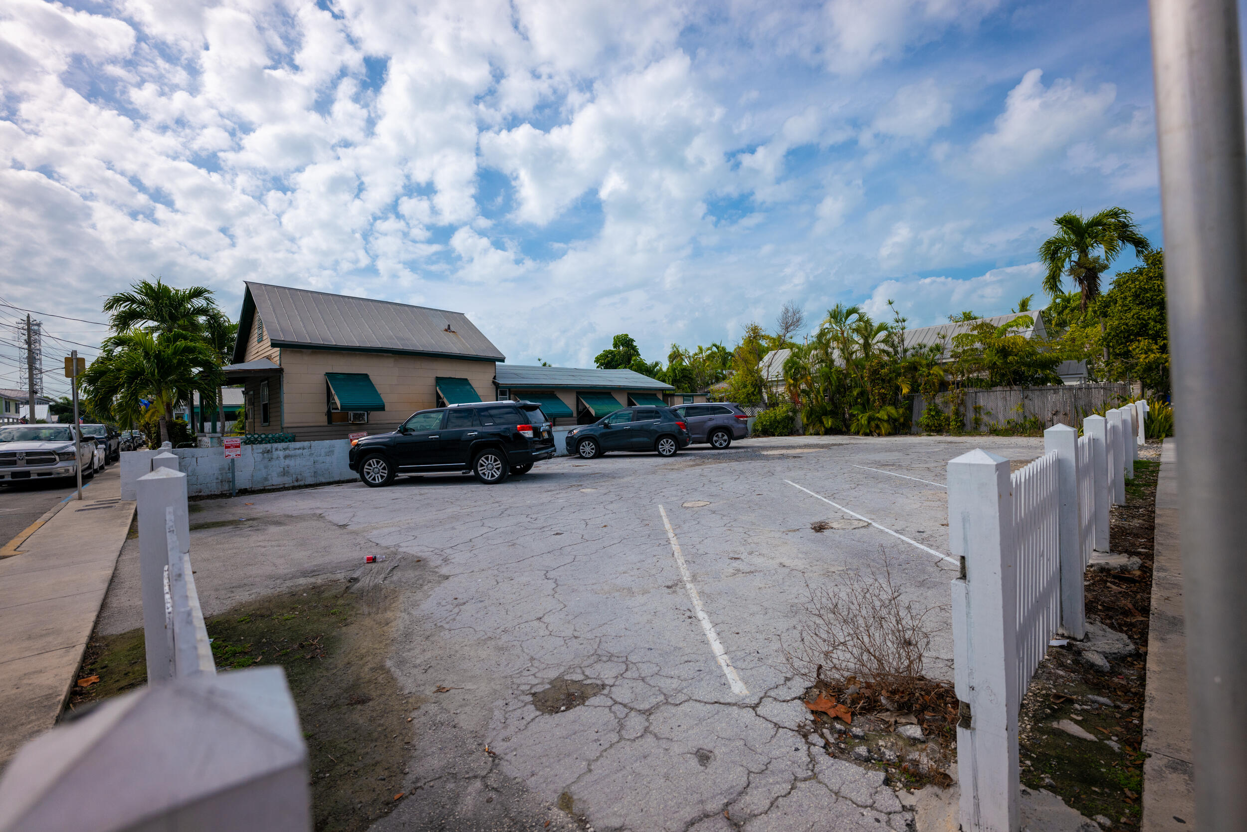 1108 Whitehead Street Key West, FL 33040 - Photo 2 of 4 a front view of a house with garden