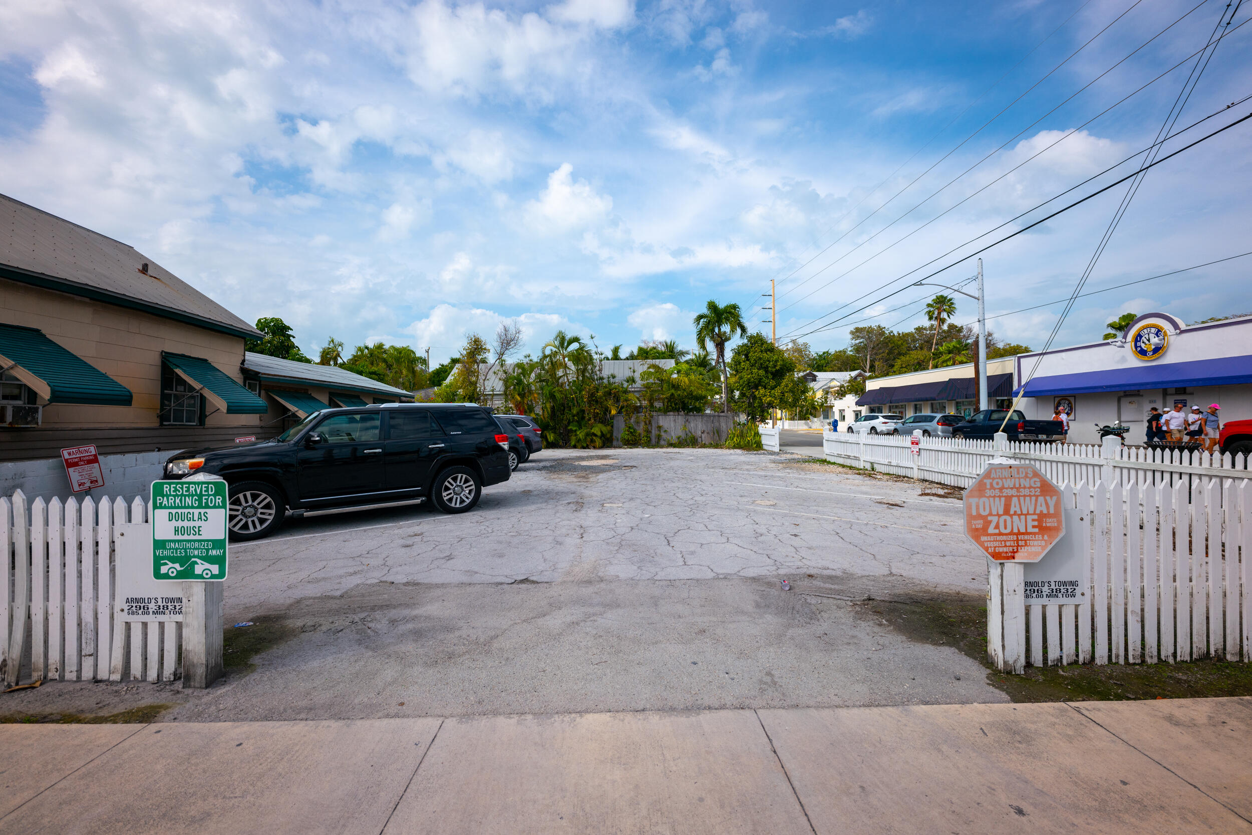 1108 Whitehead Street Key West, FL 33040 - Photo 3 of 4 a car parked in front of house