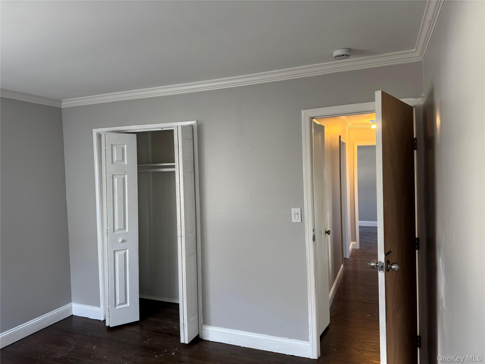 1239 August Road North Babylon, NY 11703 - Photo 12 of 16 a view of a hallway with wooden floor