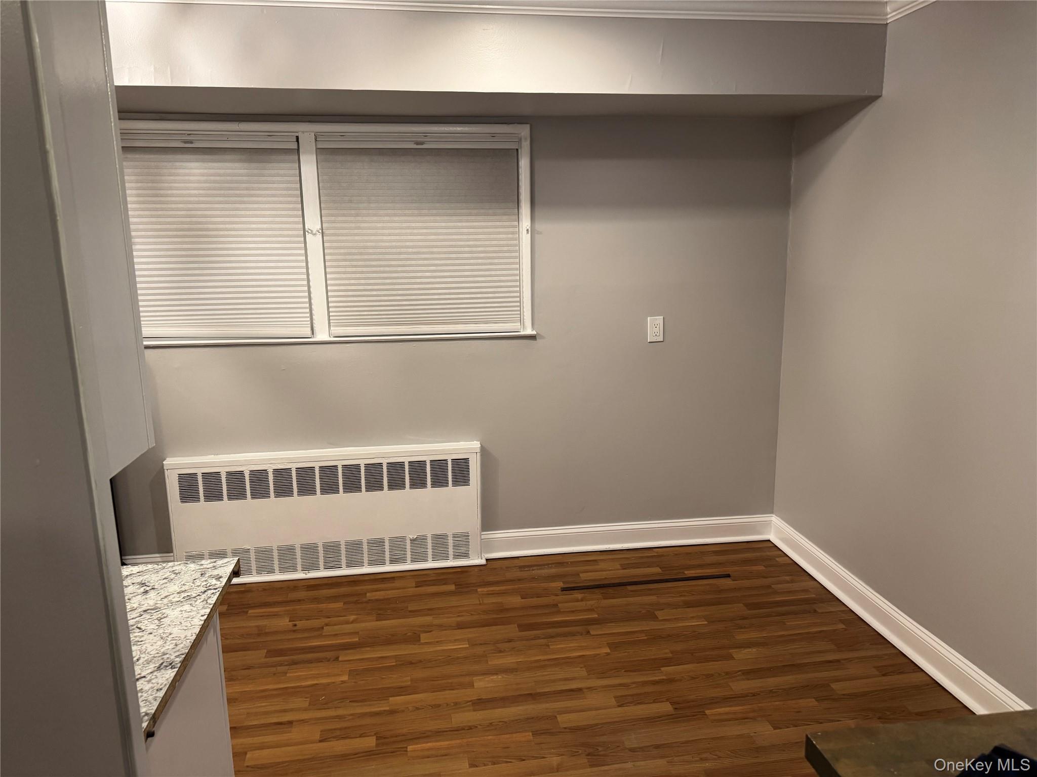 1239 August Road North Babylon, NY 11703 - Photo 5 of 16 a view of a room with wooden floor
