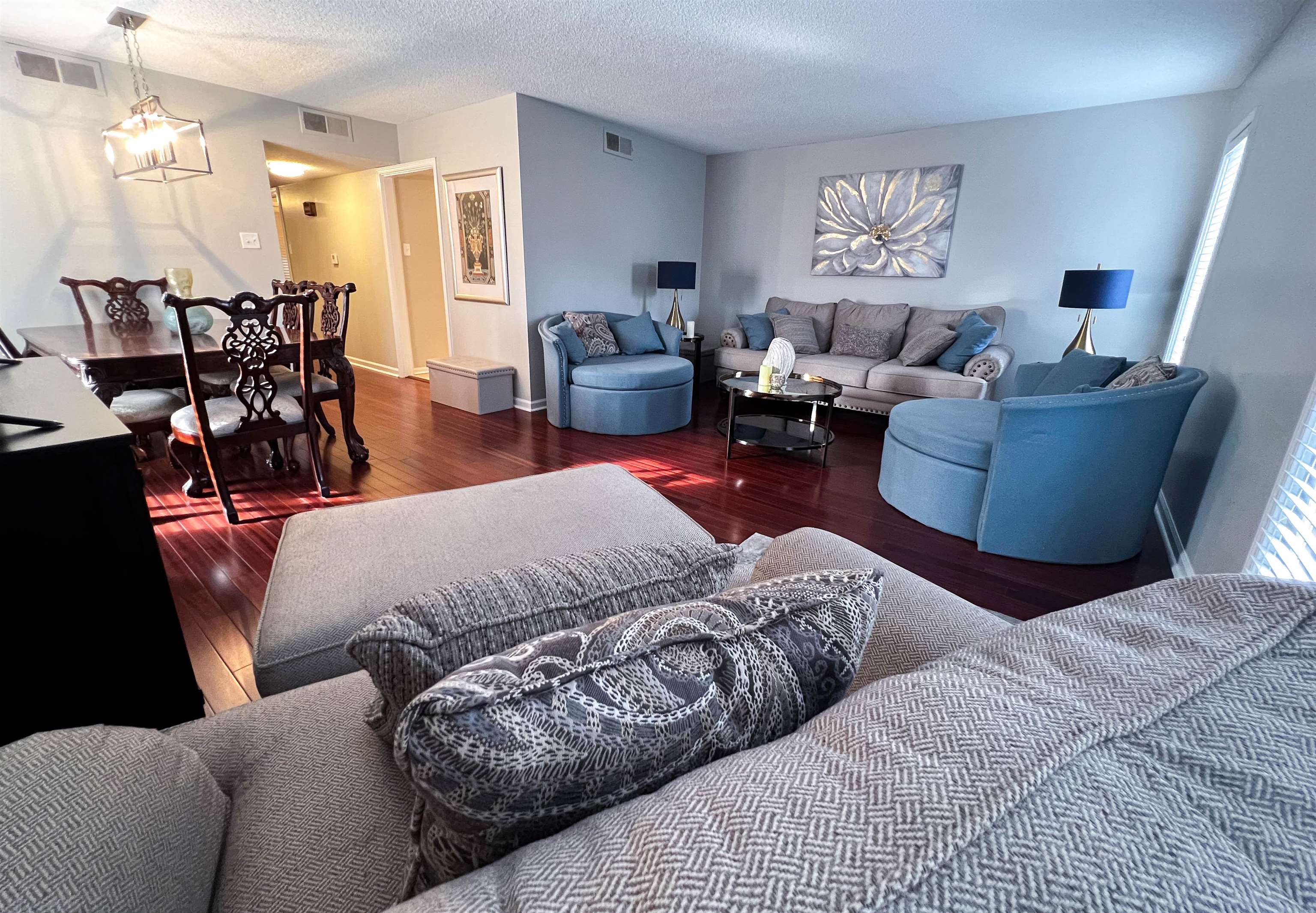 435 South Perkins Road Memphis, TN 38117 - Photo 1 of 21 Living room with a textured ceiling and dark hardwood / wood-style flooring