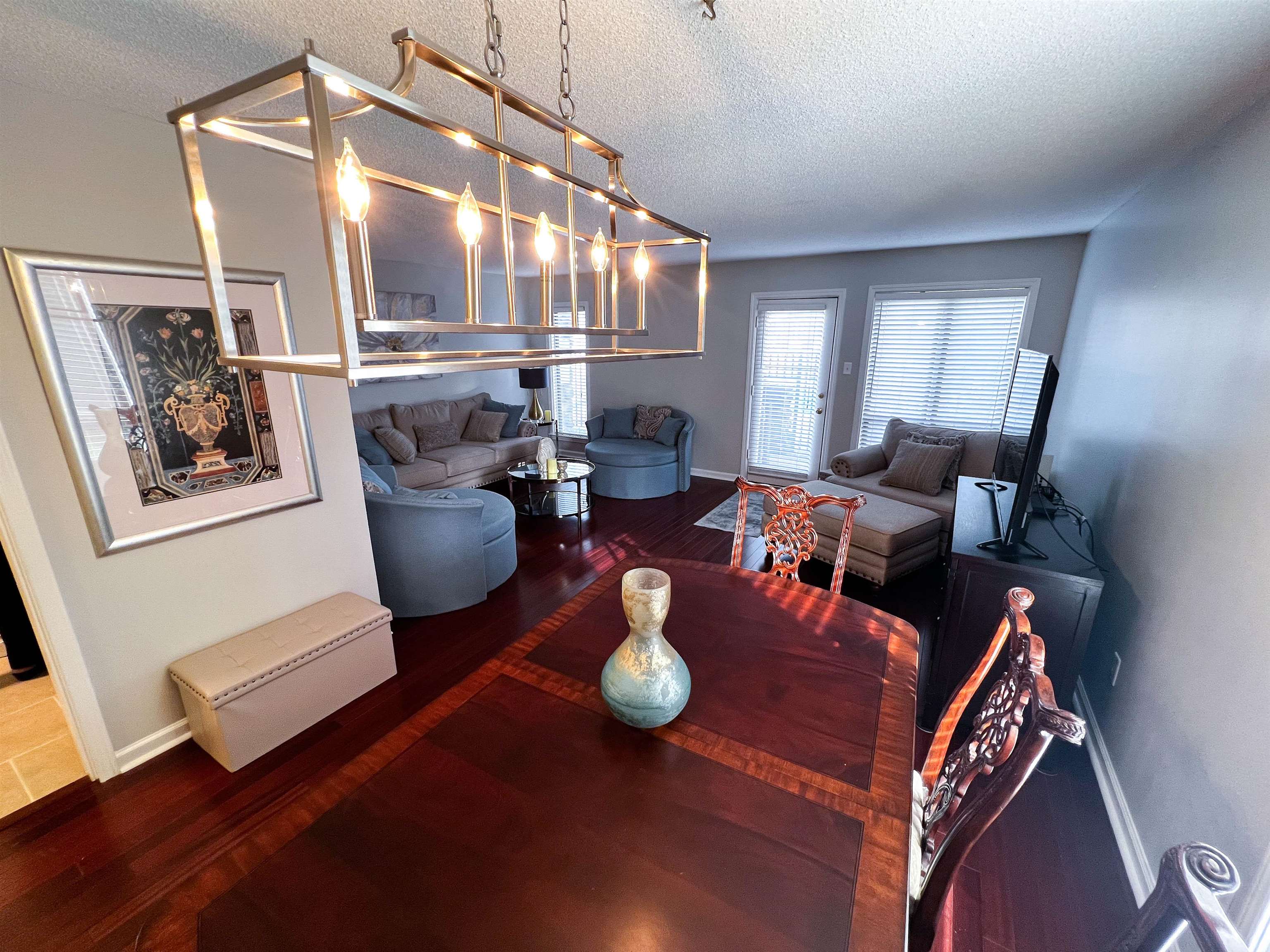 435 South Perkins Road Memphis, TN 38117 - Photo 2 of 21 Dining room featuring hardwood / wood-style floors and a textured ceiling