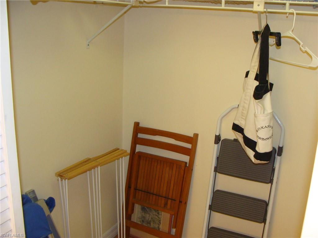 807 River Point Drive, Unit 201D Naples, FL 34102 - Photo 18 of 31 a view of walk in closet