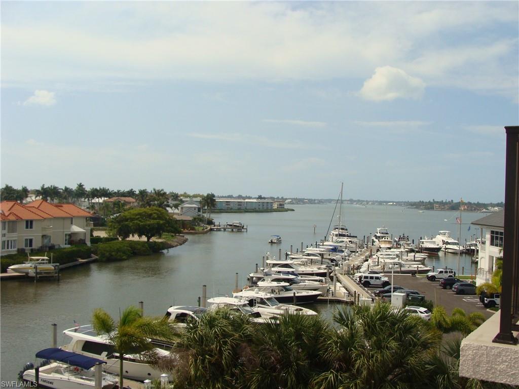 807 River Point Drive, Unit 201D Naples, FL 34102 - Photo 29 of 31 an aerial view of a city with lake view