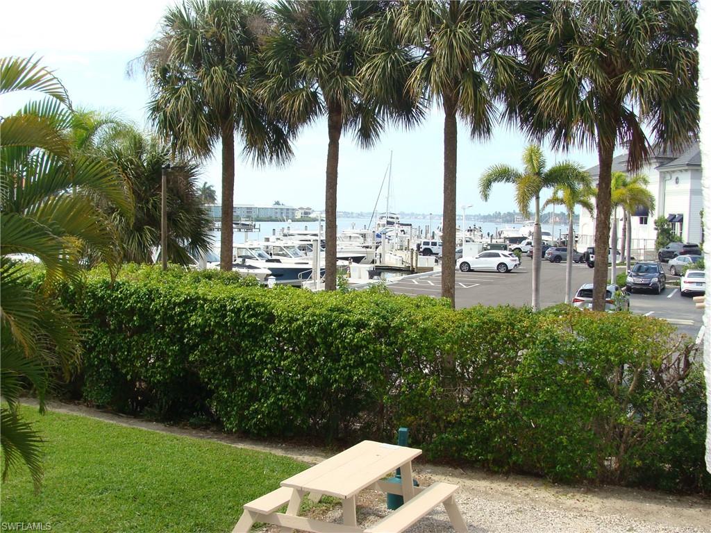 807 River Point Drive, Unit 201D Naples, FL 34102 - Photo 31 of 31 a view of a yard with palm trees
