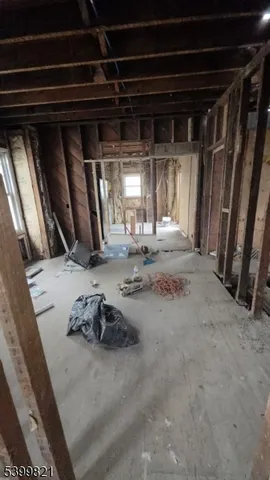 a view of a room with wooden walls