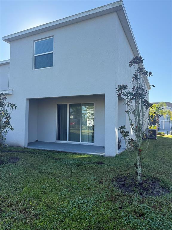 16177 Glowing Grove Avenue Odessa, FL 33556 - Photo 12 of 13 a house view with a garden space