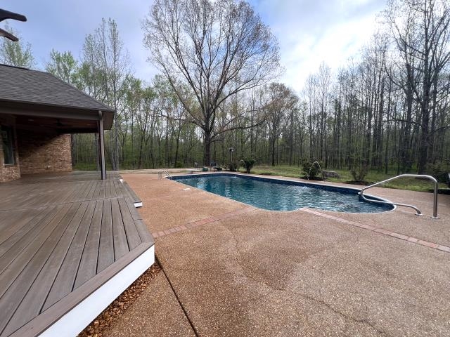 9490 Highway 196 Collierville, TN 38017 - Photo 38 of 40 Swimming pool with a deck and a patio area