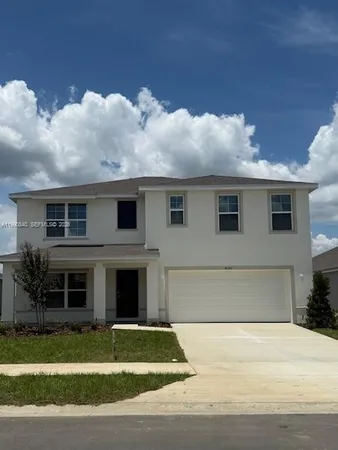a front view of house with yard