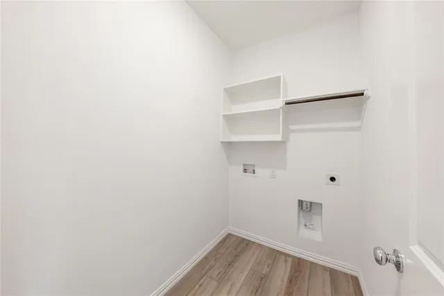 a view of small space with racks on the wall