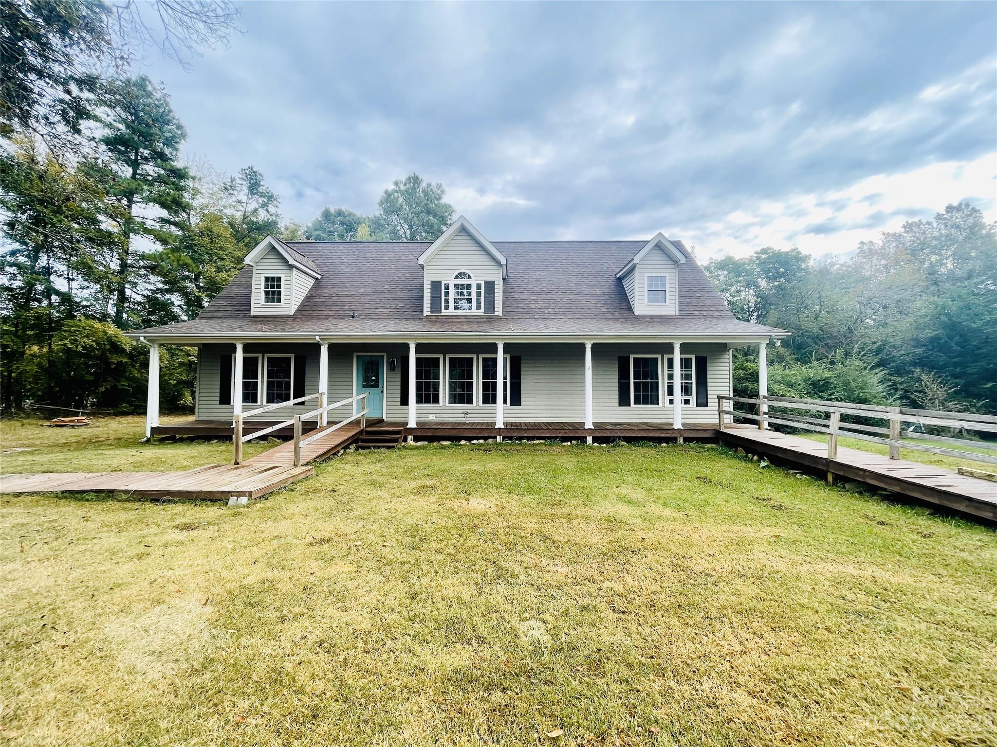 922 State Rd S-46-1102 York, SC 29745 - Photo 1 of 20 a front view of a house with swimming pool and porch
