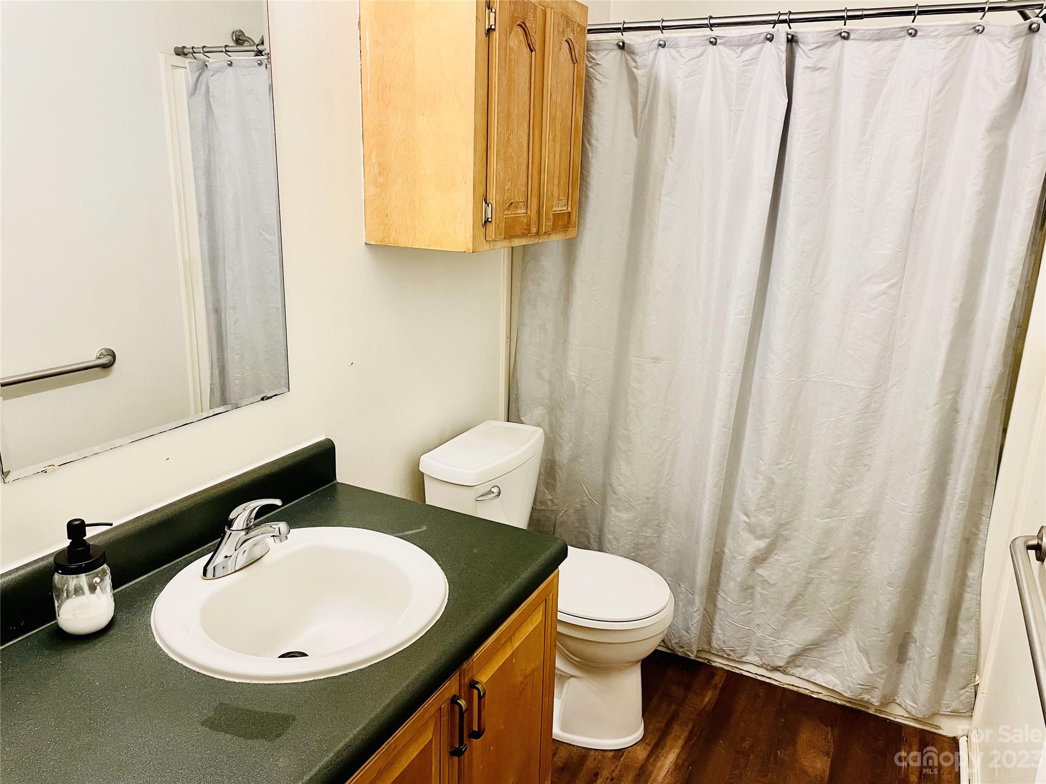 922 State Rd S-46-1102 York, SC 29745 - Photo 19 of 20 a bathroom with a sink and a mirror