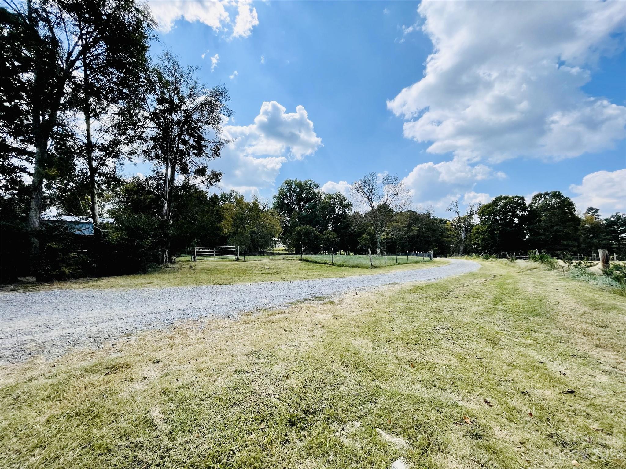 922 State Rd S-46-1102 York, SC 29745 - Photo 8 of 20 a view of a garden and basketball court