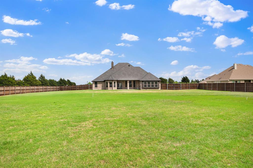 4341 Rush Road Midlothian, TX 76065 - Photo 2 of 39 Expansive fully soded yard!
