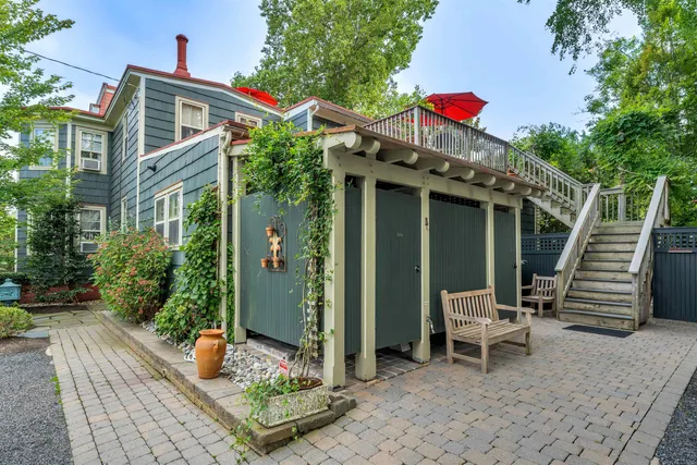 a kitchen with a sink refrigerator and microwave