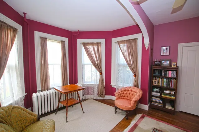 a living room with furniture and a couch