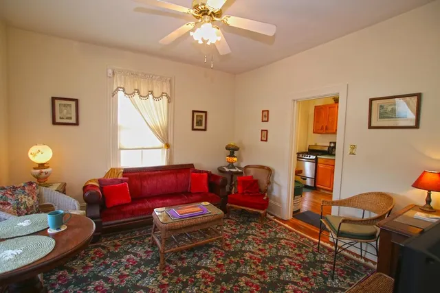 a kitchen with stainless steel appliances a stove microwave and refrigerator