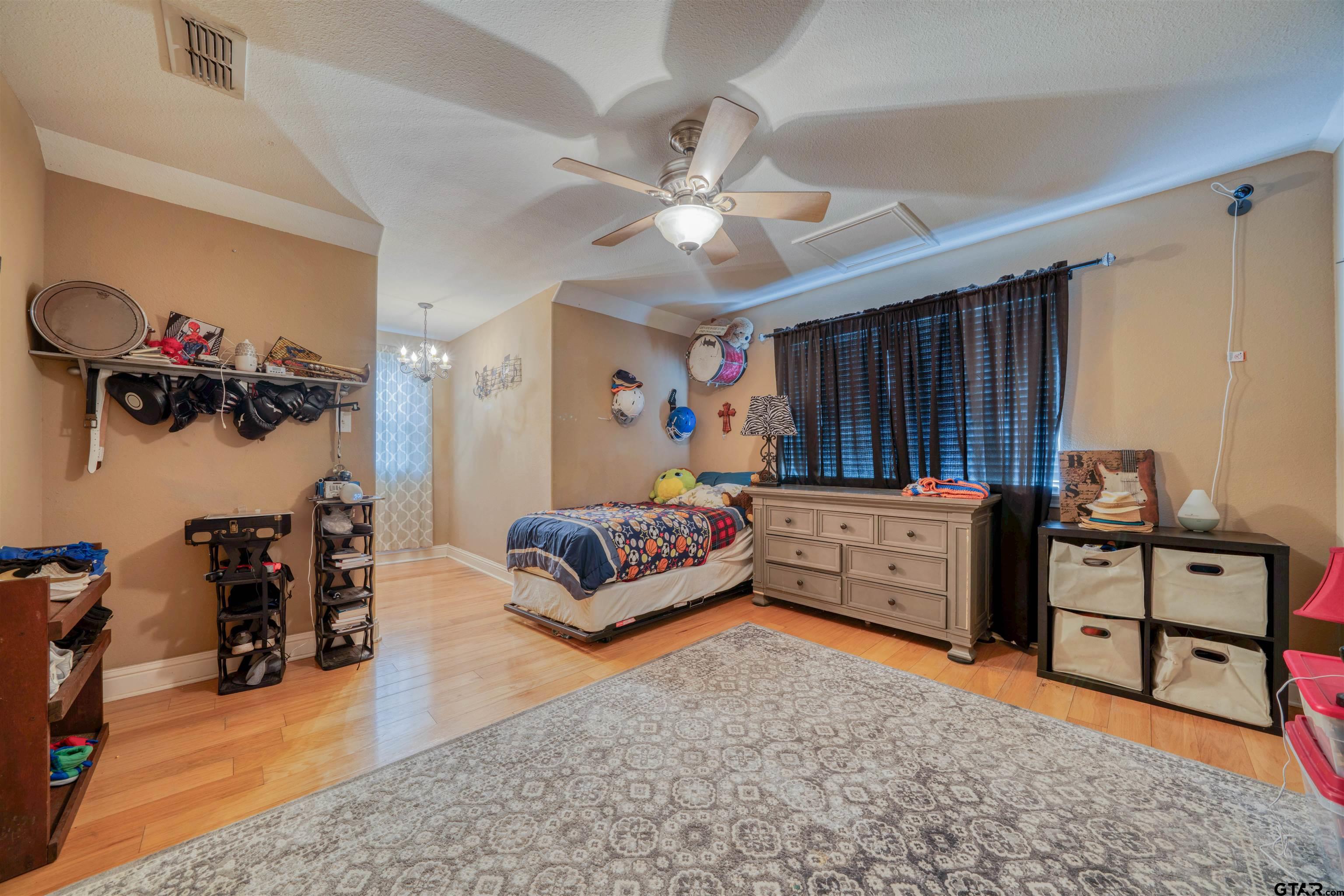 1776 Mustang Road Gilmer, TX 75645 - Photo 37 of 45 a bedroom with furniture and a dresser