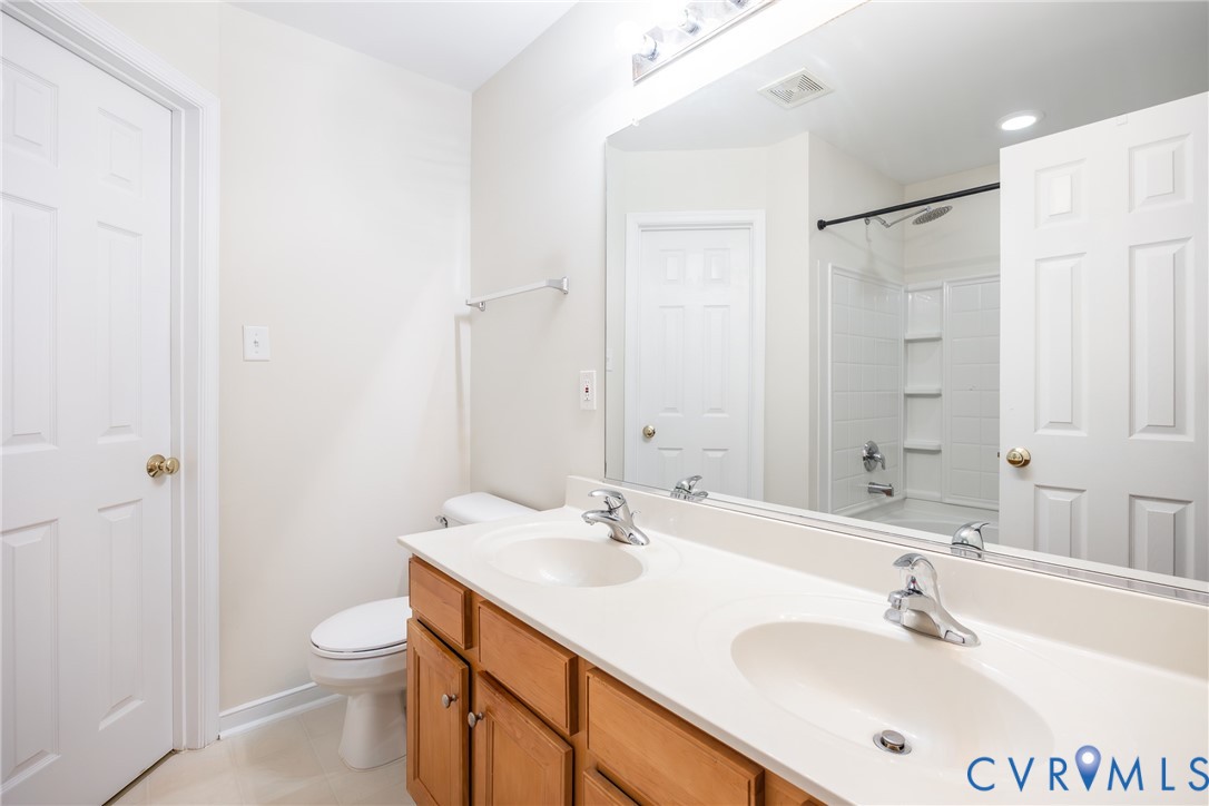 2928 Heather Ridge Drive Henrico, VA 23231 - Photo 22 of 34 Bathroom featuring a dual vanity with wood-finish
