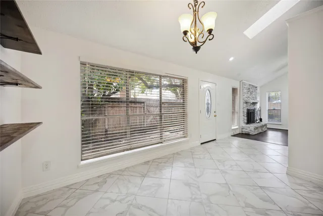 a view of a livingroom with a large window