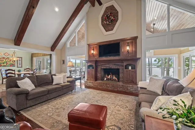 a kitchen with granite countertop a sink and wooden cabinets
