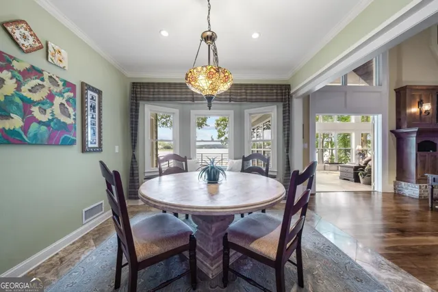 a kitchen with stainless steel appliances granite countertop a stove sink and cabinets