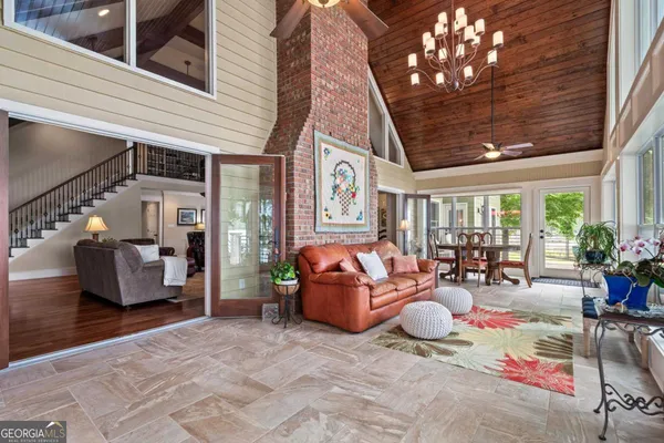 a kitchen with stainless steel appliances granite countertop a refrigerator stove and sink