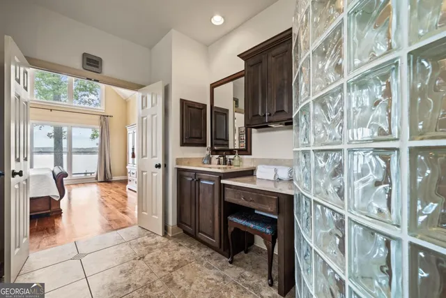 a view of an empty room with a fireplace