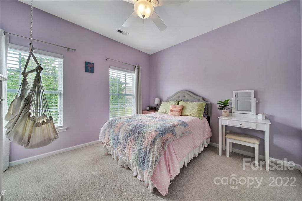 1429 Secret Path Drive Fort Mill, SC 29708 - Photo 28 of 42 a bedroom with a bed and a window