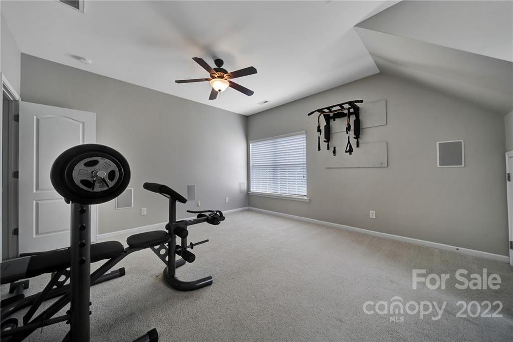 1429 Secret Path Drive Fort Mill, SC 29708 - Photo 33 of 42 a view of a room with gym equipment