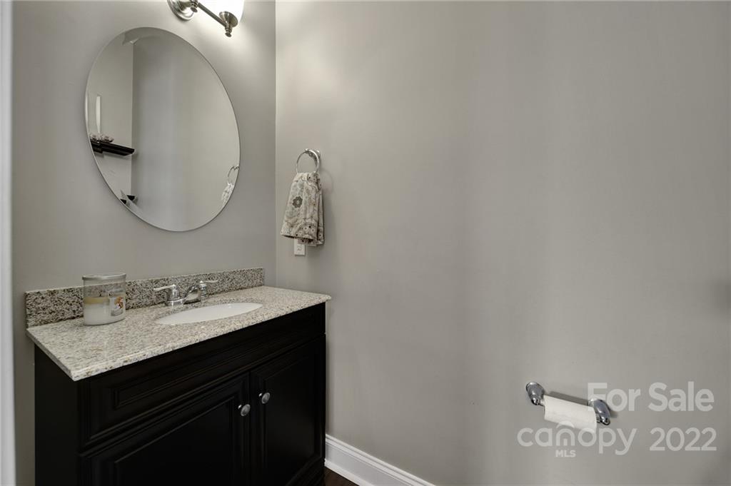 1429 Secret Path Drive Fort Mill, SC 29708 - Photo 7 of 42 a bathroom with a sink vanity and a mirror