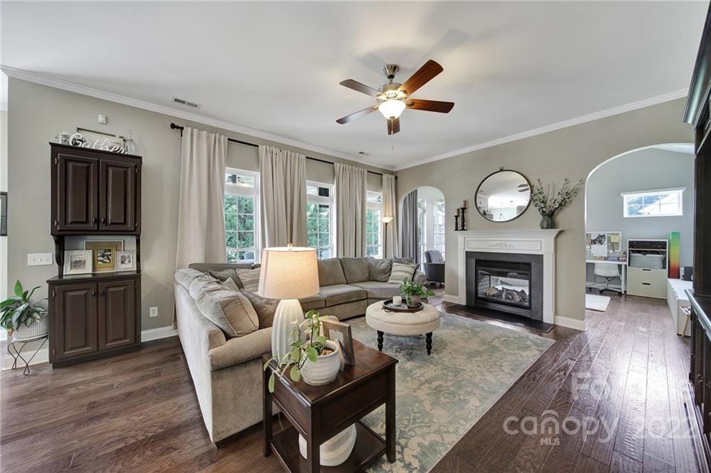 1429 Secret Path Drive Fort Mill, SC 29708 - Photo 8 of 42 a living room with furniture and a fireplace