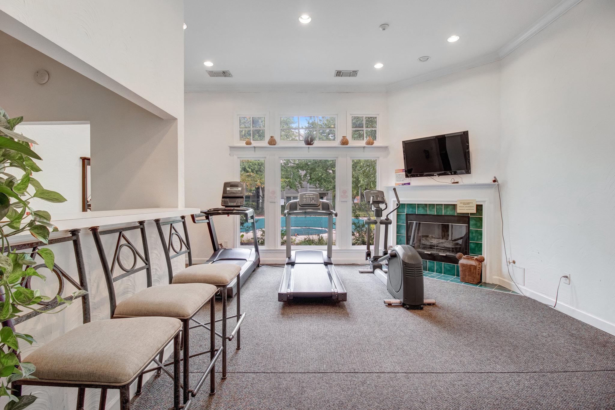 12005 Taliesin Place, Unit 36 Reston, VA 20190 - Photo 33 of 37 Community room and gym overlooking the pool