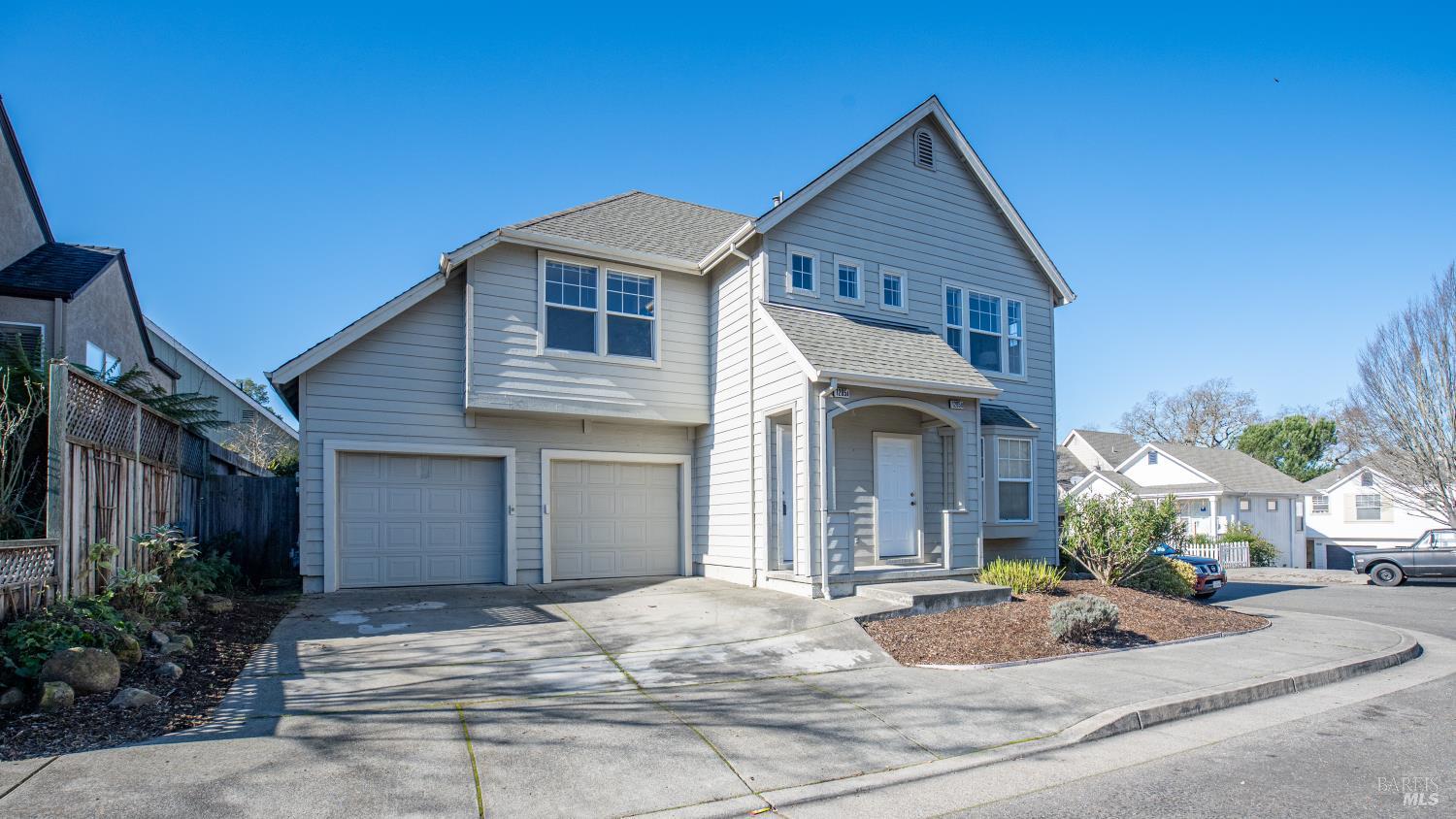 1205 Hidden Creek Place Santa Rosa, CA 95409 - Photo 1 of 1 a front view of a house with yard and garage