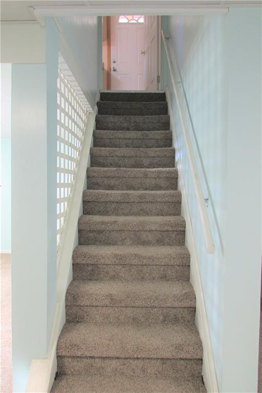 668 Kelso Road Mt. Lebanon, PA 15243 - Photo 17 of 25 Easy stairway from lower level to first floor.