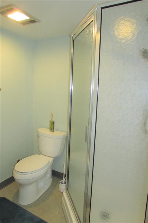 668 Kelso Road Mt. Lebanon, PA 15243 - Photo 18 of 25 Lower level bathroom has a stand-up shower with glass surround.