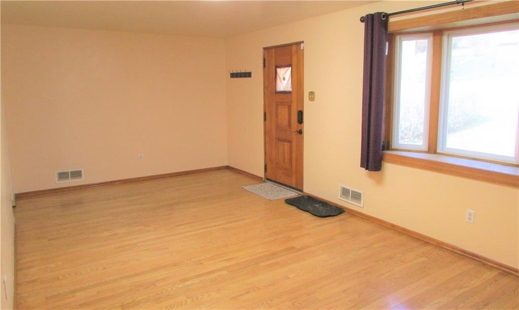 668 Kelso Road Mt. Lebanon, PA 15243 - Photo 3 of 25 Another view of the living room with gleaming hardwood floors and bay window.