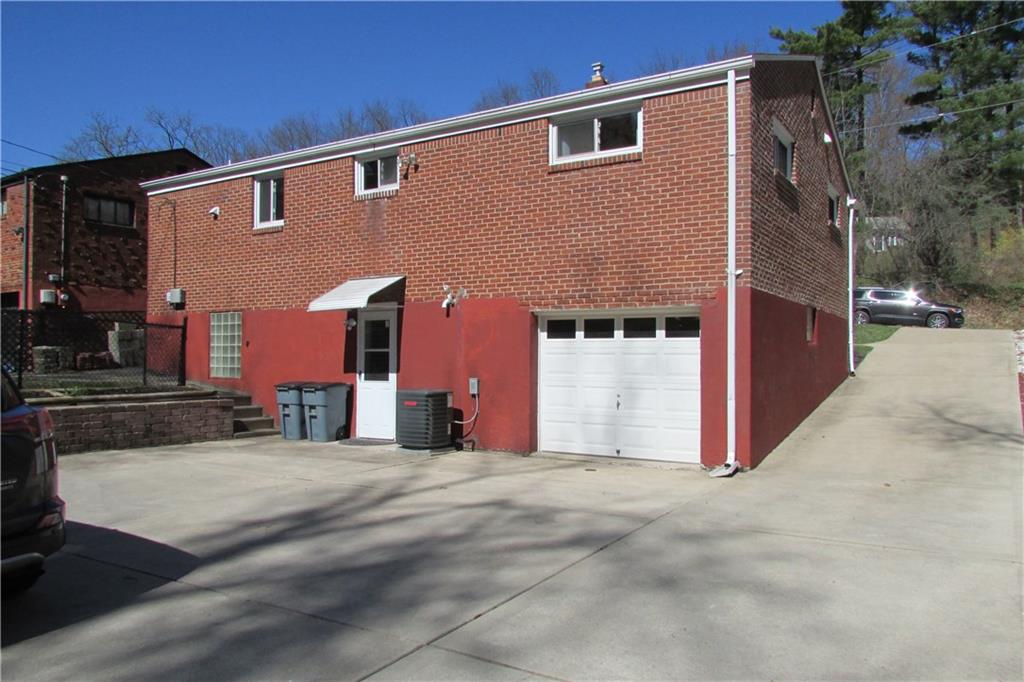 668 Kelso Road Mt. Lebanon, PA 15243 - Photo 21 of 25 Rear of home shows how nice and neat it is... Newer doors, windows, and all that beautiful cement!
