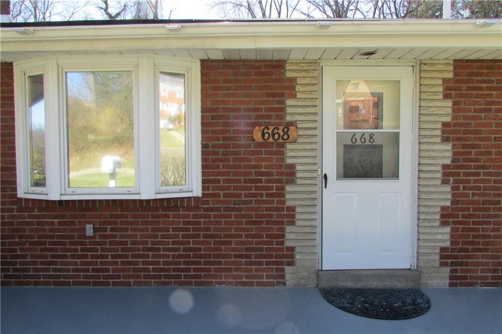 668 Kelso Road Mt. Lebanon, PA 15243 - Photo 24 of 25 A closer view of the stone detail around the front door and the living room bay window.