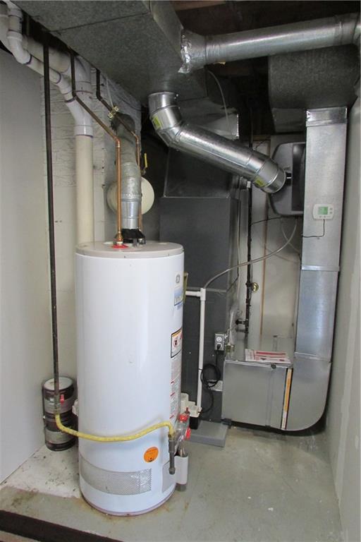 668 Kelso Road Mt. Lebanon, PA 15243 - Photo 25 of 25 Furnace and AC installed in 2018, plenty of storage in the opposite side of this utility room also.